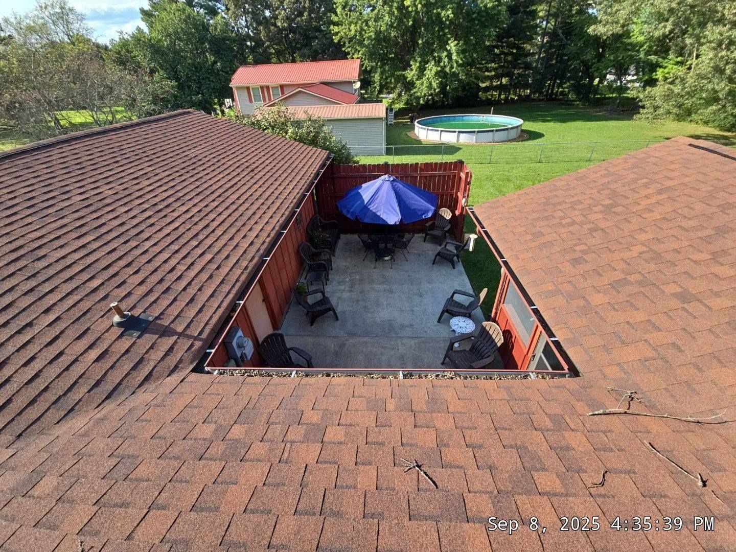 Shingle roof work over a back patio